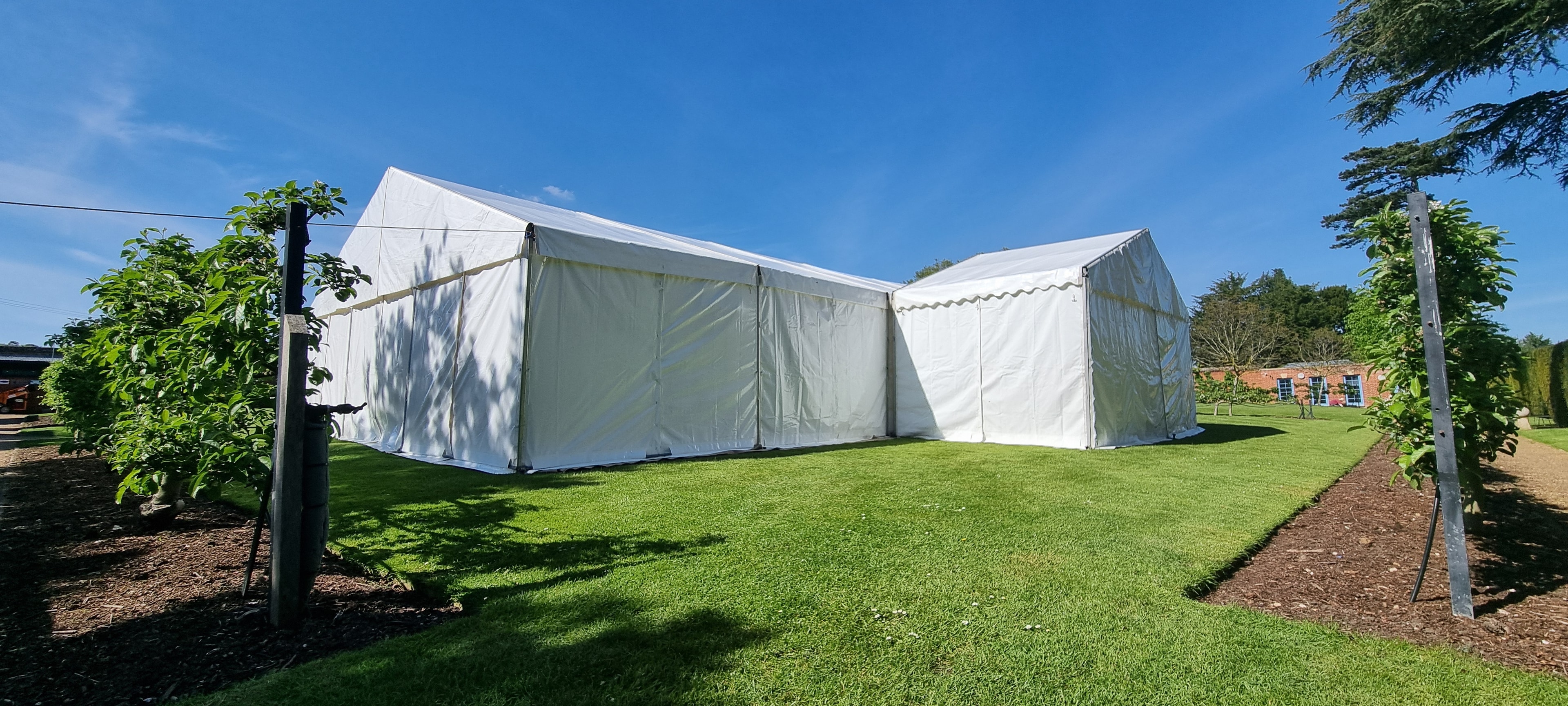 White event marquee on a green lawn