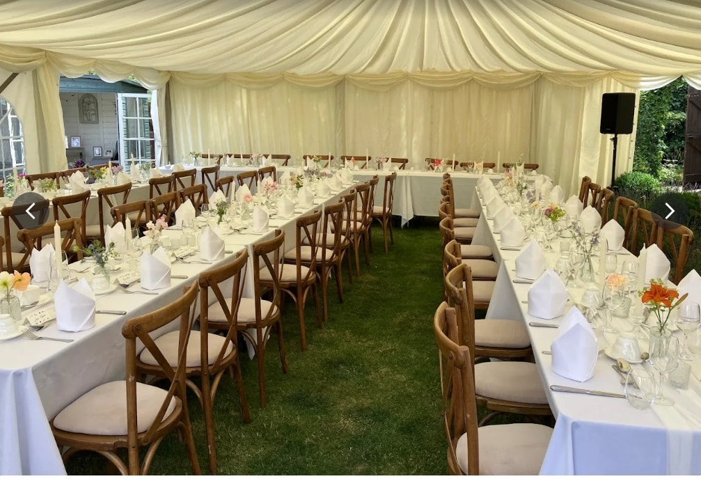 Elegant wedding reception inside a marquee